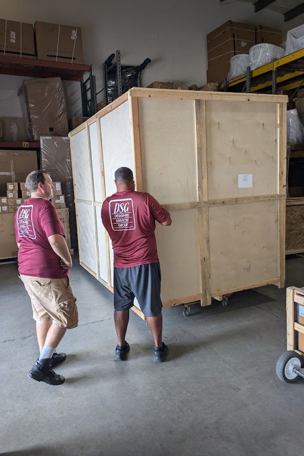 dsg-unpacking-furniture-crate-in-warehouse